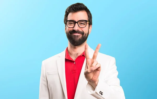 Brunette Man Glasses Counting Two Colorful Background — Stock Photo, Image
