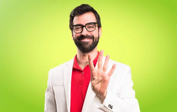 Hombre Morena Con Gafas Contando Cuatro Sobre Fondo Colorido — Foto de Stock