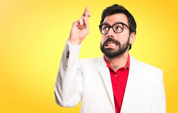 Brunette Man Glasses His Fingers Crossing Colorful Background — Stock Photo, Image