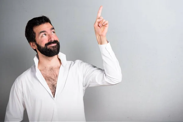 Handsome Man Beard Pointing Grey Background — Stock Photo, Image