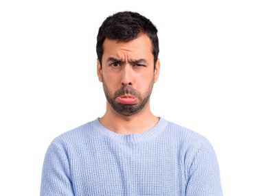 Üzgün ve depresyonda ifade ile mavi kazaklı adam. Ciddi jest