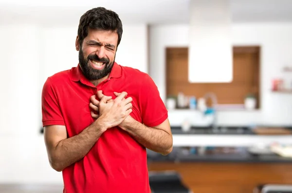 Hombre Guapo Con Dolor Corazón Dentro Casa —  Fotos de Stock