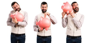 Yakışıklı bir servet tutan yelek ile kümesi