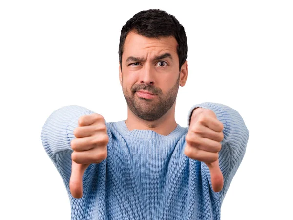 Handsome Man Showing Thumb Sign Negative Expression — Stock Photo, Image