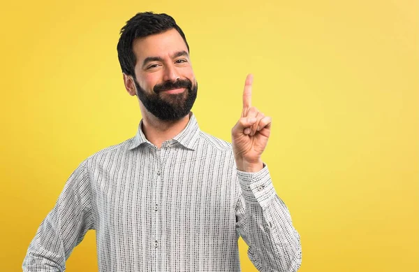 Knappe Man Met Baard Tellen Nummer Één Teken — Stockfoto