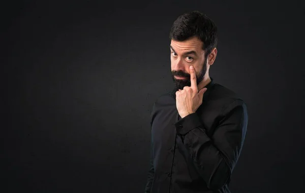 Handsome Man Beard Showing Something Black Background — Stock Photo, Image