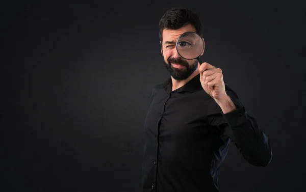 Handsome Man Beard Magnifying Glass Black Background — Stock Photo, Image