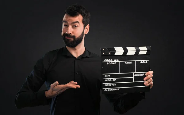 Handsome Man Beard Holding Clapperboard Black Background — Stock Photo, Image