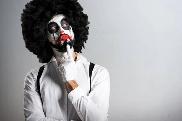 Killer Clown Denken Auf Strukturiertem Hintergrund — Stockfoto