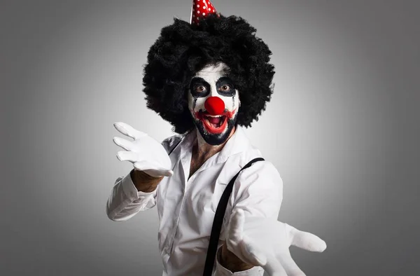 Killer Clown Präsentiert Etwas Auf Strukturiertem Hintergrund — Stockfoto