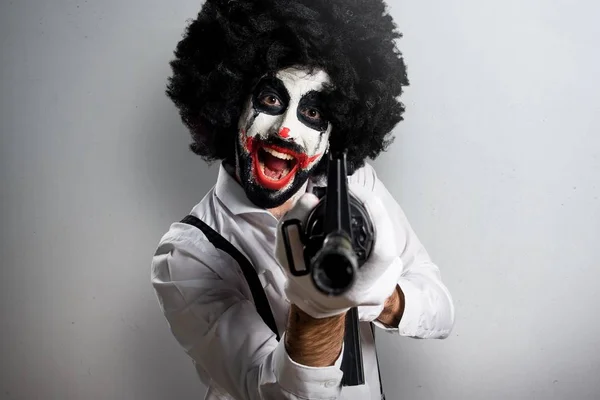 Killer Clown Mit Gewehr Auf Texturiertem Hintergrund — Stockfoto