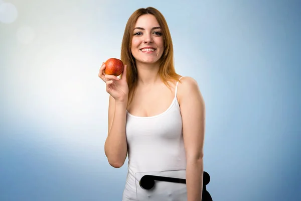 Beautiful Young Girl Weighing Machine Apple Unfocused Background — Stock Photo, Image