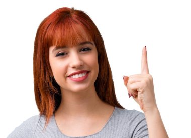 Bir numaralı işaret sayma genç Kızıl saçlı kız