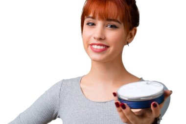 Nemlendirici ile genç Kızıl saçlı kız