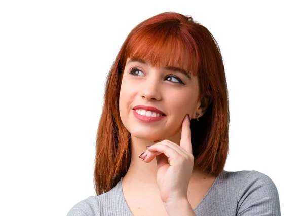 Menina Ruiva Jovem Pensando Uma Ideia — Fotografia de Stock