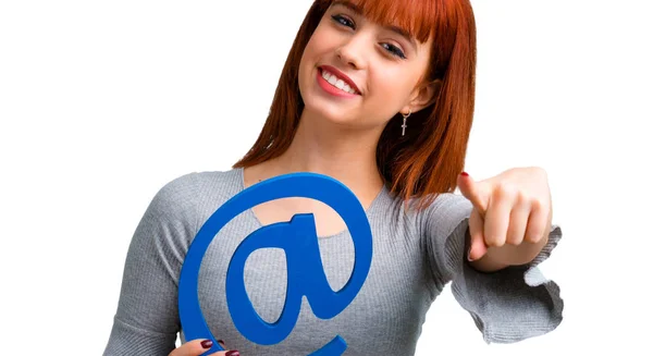 Young Redhead Girl Holding Icon Dot Com — Stock Photo, Image