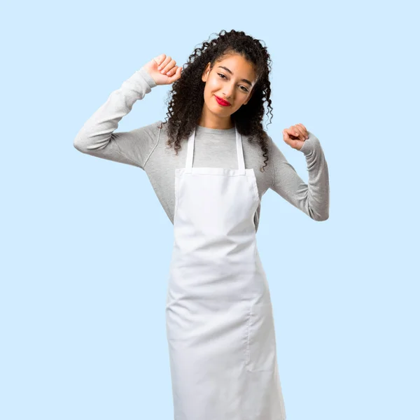 Young Girl Apron Listening Music Dancing Isolated Blue Background — Stock Photo, Image