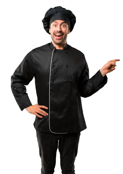 Chef Man Uniforme Negro Señalando Dedo Hacia Lado Presentando Producto — Foto de Stock