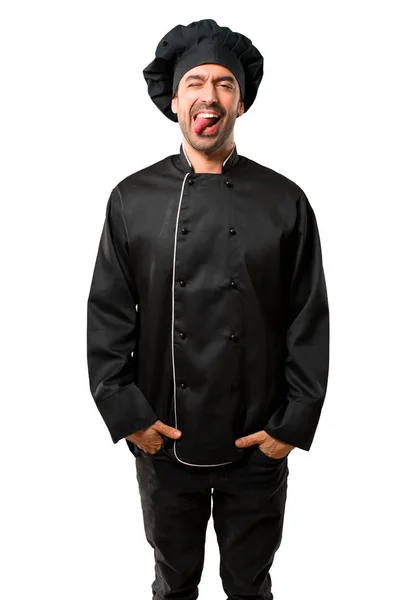 Kuchař Muž Černé Jednotné Zobrazení Jazyka Kameru Legrační Pohled Izolované — Stock fotografie