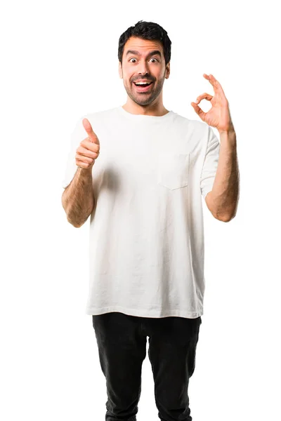 Jonge Man Met Witte Shirt Toont Een Teken Met Vingers — Stockfoto