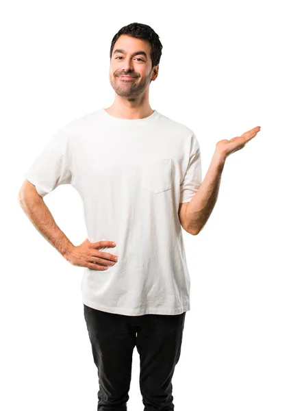 Young Man White Shirt Holding Copyspace Imaginary Palm Insert Isolated — Stock Photo, Image