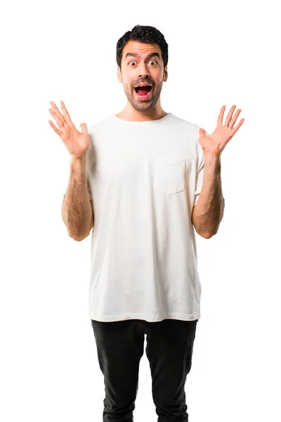 Hombre Joven Con Camisa Blanca Con Sorpresa Expresión Facial Impactada —  Fotos de Stock