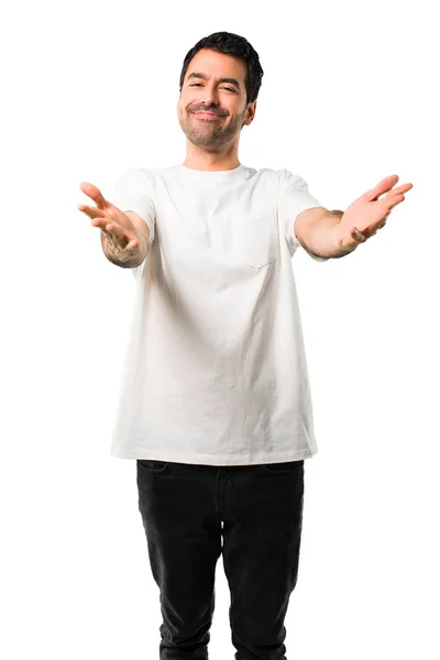 Молодой Человек Белой Рубашке Представляет Приглашает Прийти Рукой Счастье Пришли — стоковое фото