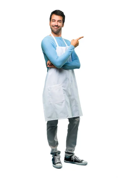 Uma Foto Completa Homem Usando Avental Apontando Para Lado Com — Fotografia de Stock