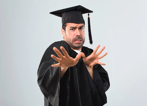 Homem Seu Dia Formatura Universidade Pouco Nervoso Assustado Esticando Mãos — Fotografia de Stock