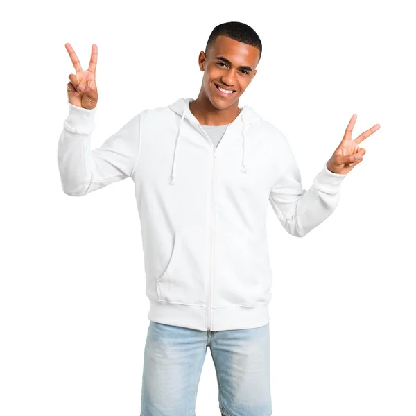 Dark Skinned Young Man White Sweatshirt Smiling Showing Victory Sign — Stock Photo, Image