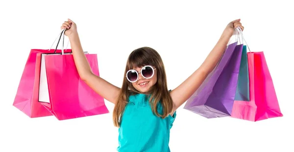 Μικρό Χαριτωμένο Κορίτσι Πολλές Τσάντες Για Ψώνια — Φωτογραφία Αρχείου