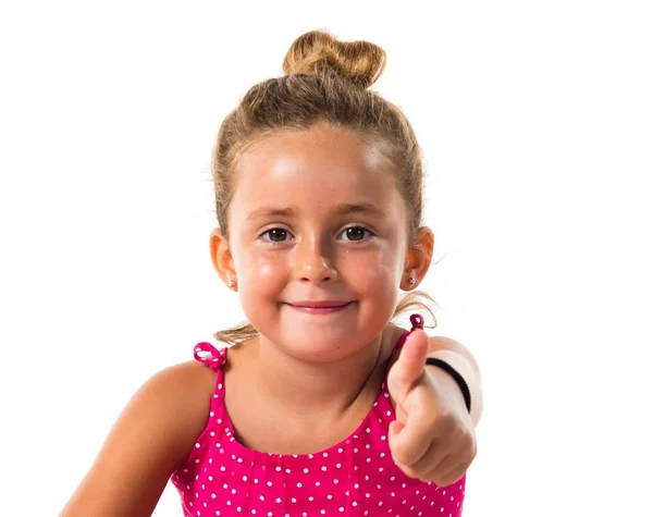 Niña Con Vestido Rosa Con Pulgar Hacia Arriba —  Fotos de Stock