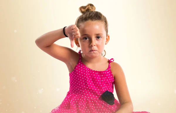 Little Girl Pink Dress Doing Bad Signal — Stock Photo, Image