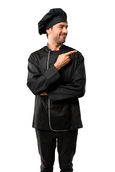 Chef Man Uniforme Preto Apontando Para Lado Com Dedo Para — Fotografia de Stock