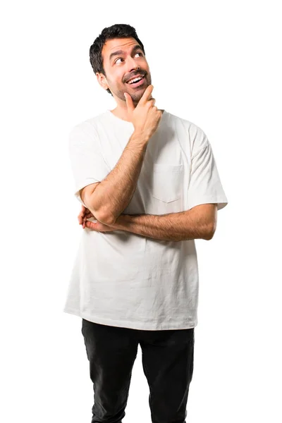 Young Man White Shirt Standing Thinking Idea Isolated White Background — Stock Photo, Image