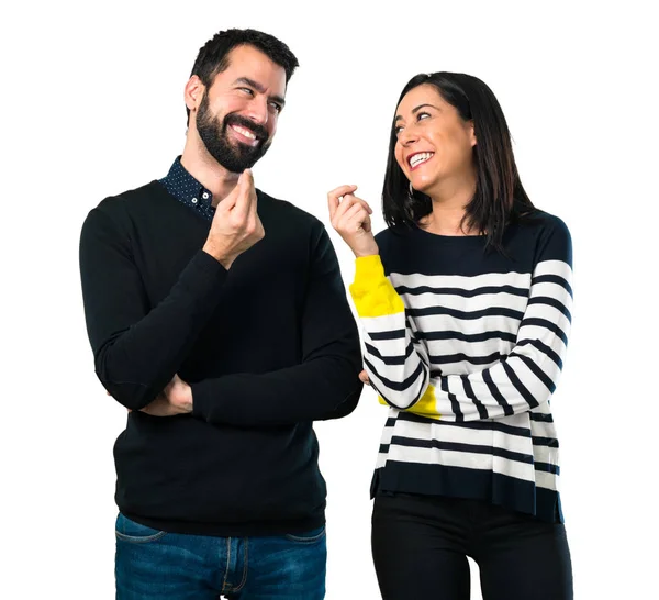 Pareja Haciendo Gesto Dinero Sobre Fondo Blanco —  Fotos de Stock