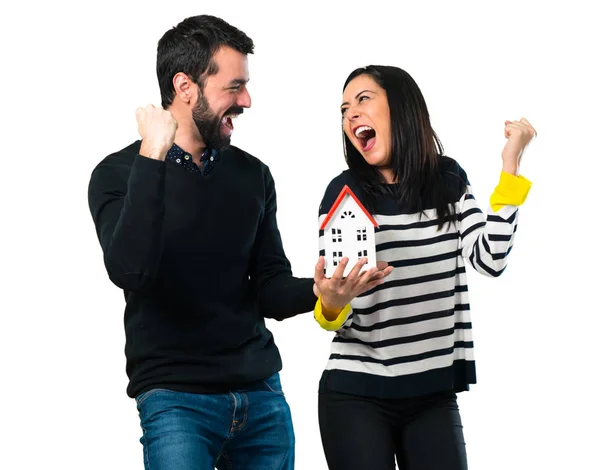 Couple Holding Little House White Background — Stock Photo, Image