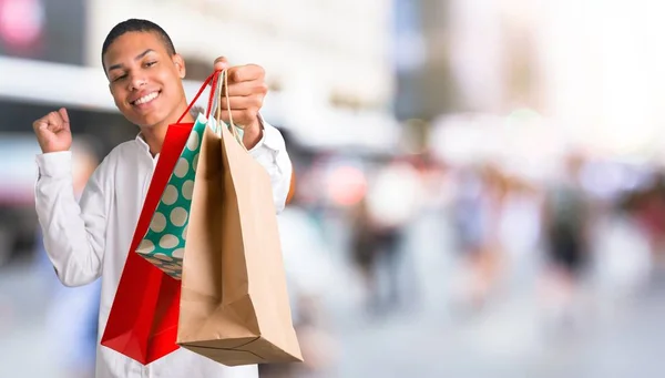 Young African American Man White Shirt Holding Lot Shopping Bags — Stock Photo, Image