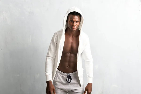 Strong african american  sportman wearing sweatshirt