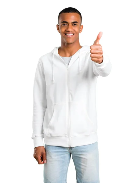 Jovem Pele Escura Com Camisola Branca Dando Gesto Nos Polegares — Fotografia de Stock