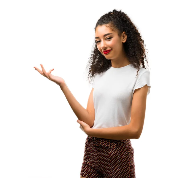 Young Girl Curly Hair Extending Hands Side Smiling Presenting Inviting — Stock Photo, Image