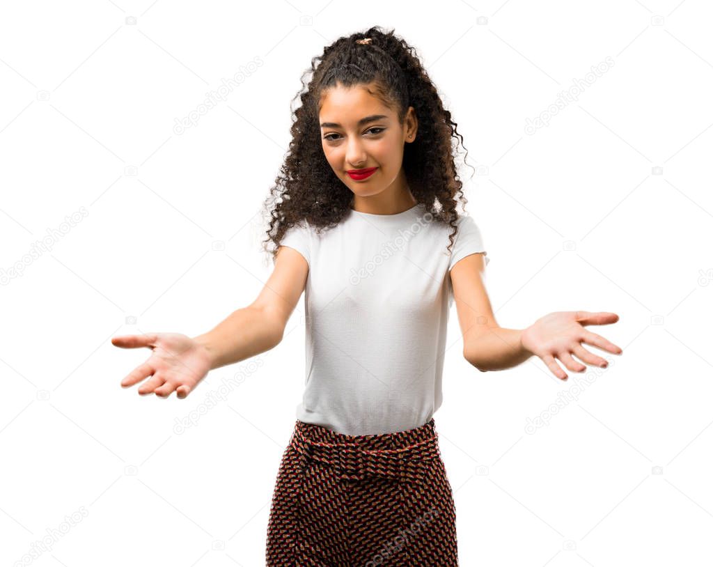Young girl with curly hair presenting and inviting to come with hand. Happy that you came on white background