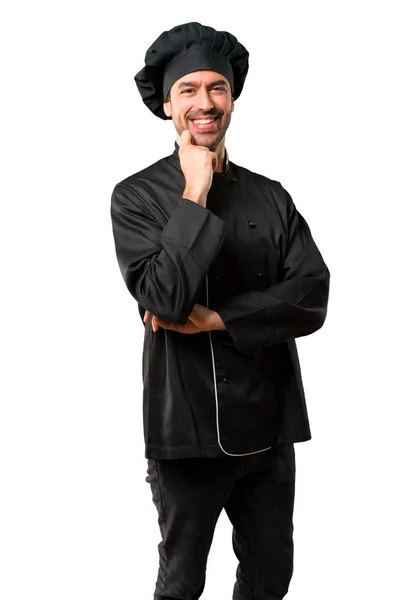Szef Kuchni Człowieka Czarny Uniform Uśmiechający Się Słodki Wyrażenie Białym — Zdjęcie stockowe