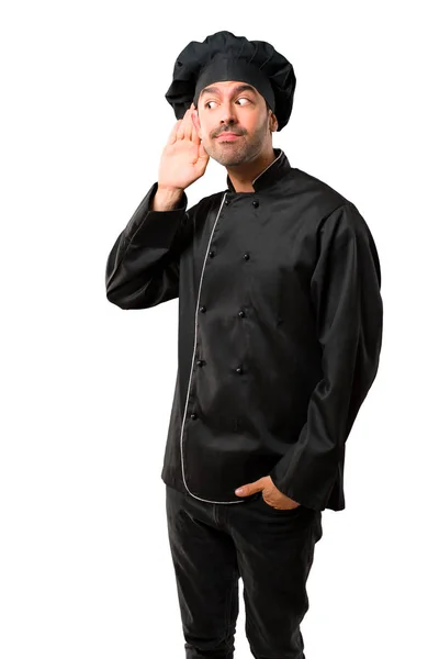 Chef Hombre Uniforme Negro Escuchando Algo Poniendo Mano Oreja Sobre — Foto de Stock