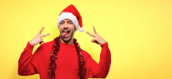 Man Red Clothes Celebrating Christmas Holidays Showing Tongue Camera Having — Stock Photo, Image