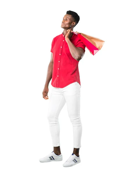 바탕에 쇼핑백을 아프리카계 미국인 남자의 — 스톡 사진