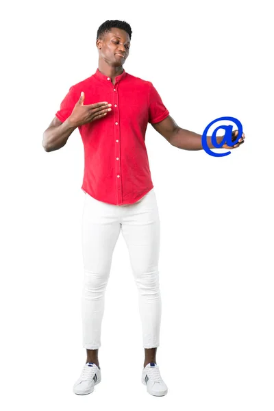 Full Body Young African American Man Holding Icon Dot Com — стоковое фото