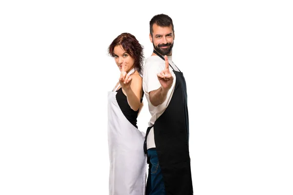 Couple Cooks Showing Lifting Finger Sign Best Isolated White Background — Stock Photo, Image