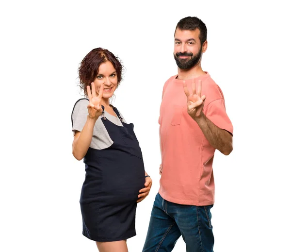 Casal Com Mulher Grávida Feliz Contando Três Com Dedos Fundo — Fotografia de Stock