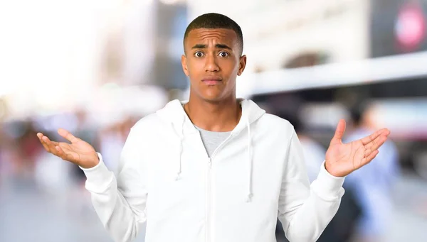 Dark Skinned Young Man White Sweatshirt Having Doubts Confuse Face — Stock Photo, Image